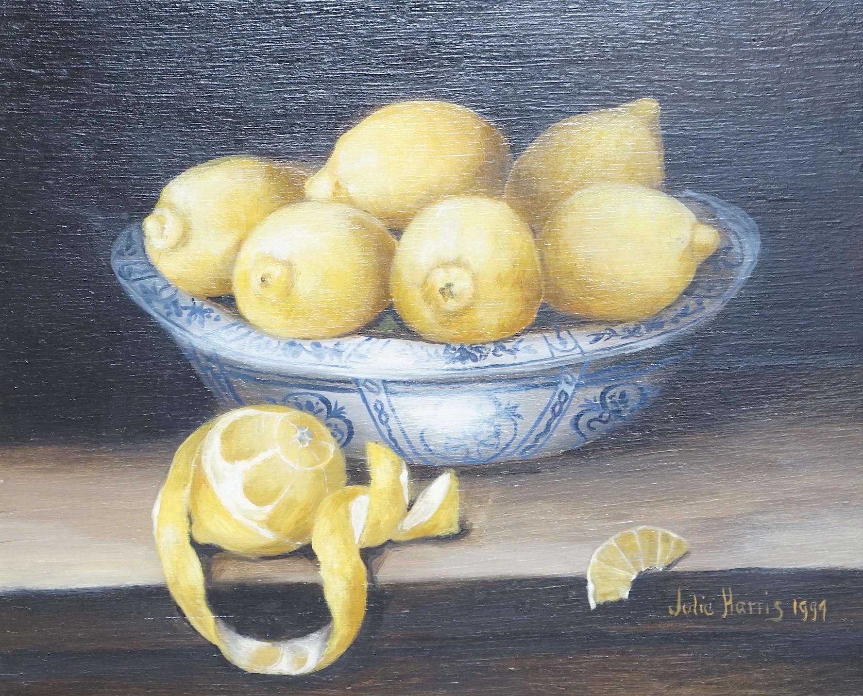 Julie Harris (b.1953), oil on panel, Still life of lemons in a delft bowl, signed and dated 1994, 24 x 30cm
